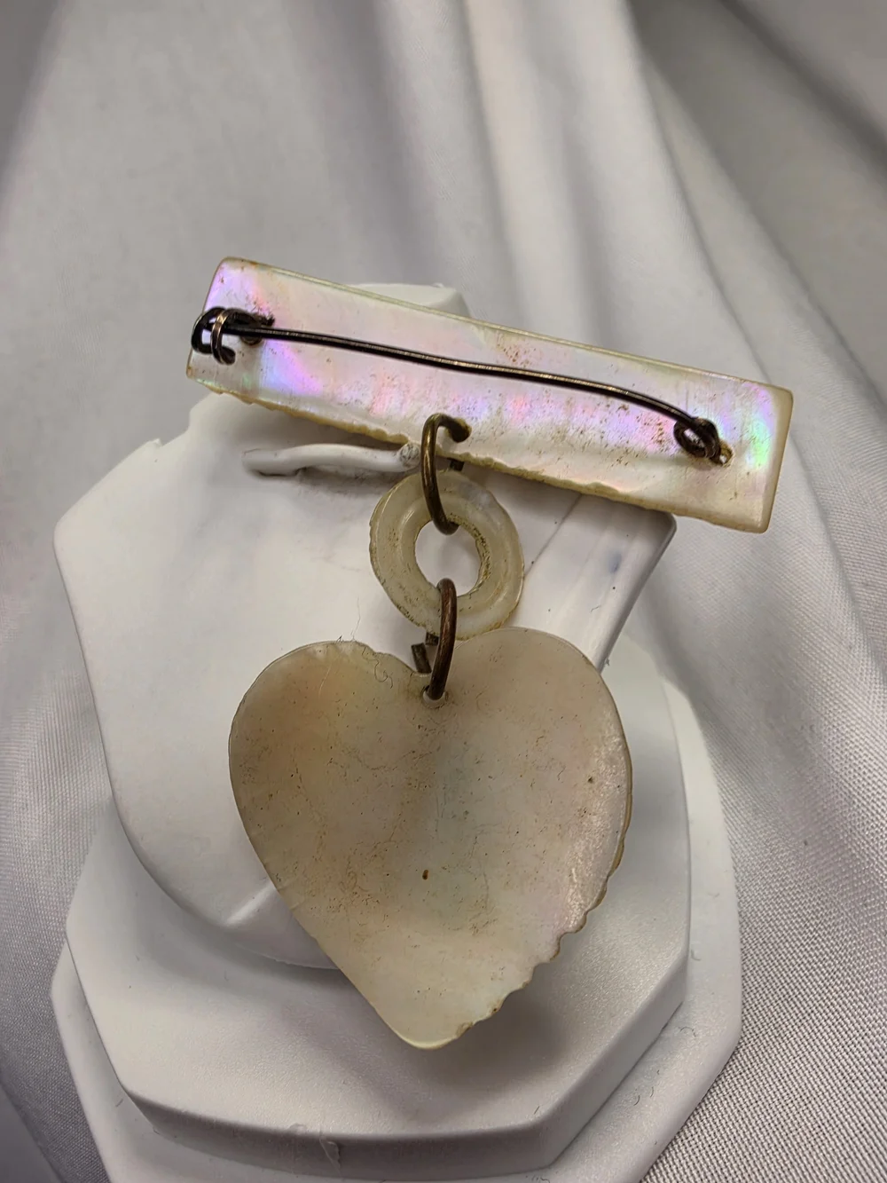 Vintage World War II-era U.S. Navy sweetheart brooch, made from carved MOP